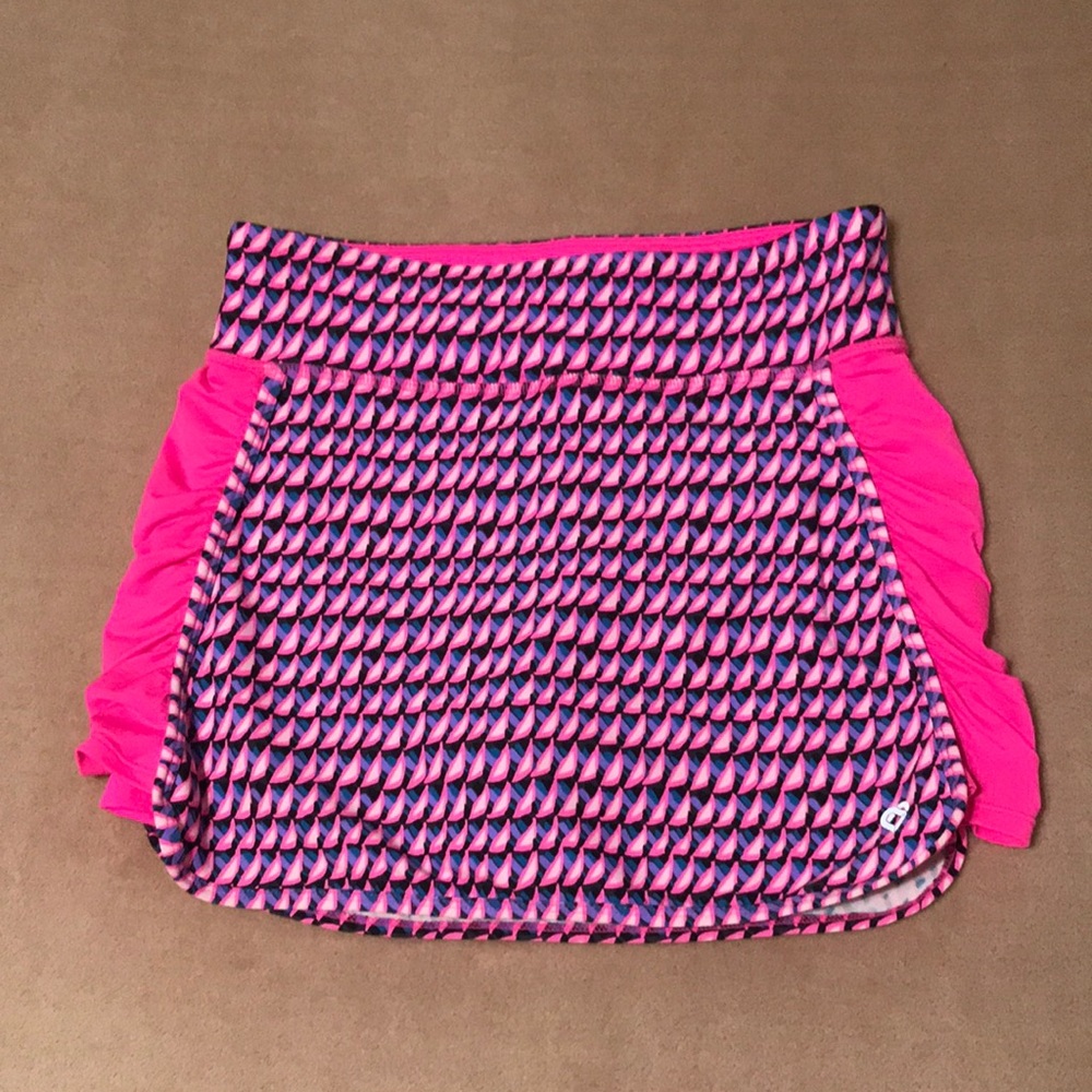 NWOT Colosseum golf, tennis, workout, or casual wear skort. Pink patterned. XS.